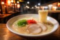 長浜ラーメンの丼と福岡の屋台グルメをイメージした画像