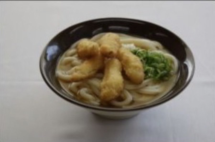 牧のうどん公式サイトに掲載された、ごぼう天とねぎをのせたうどん